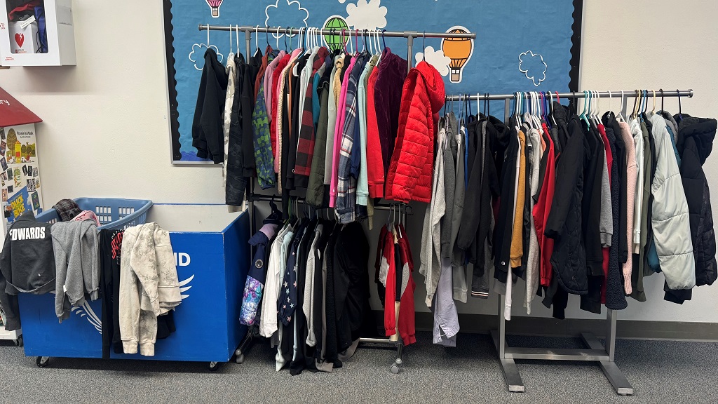 Picture of clothing hung on a rack.