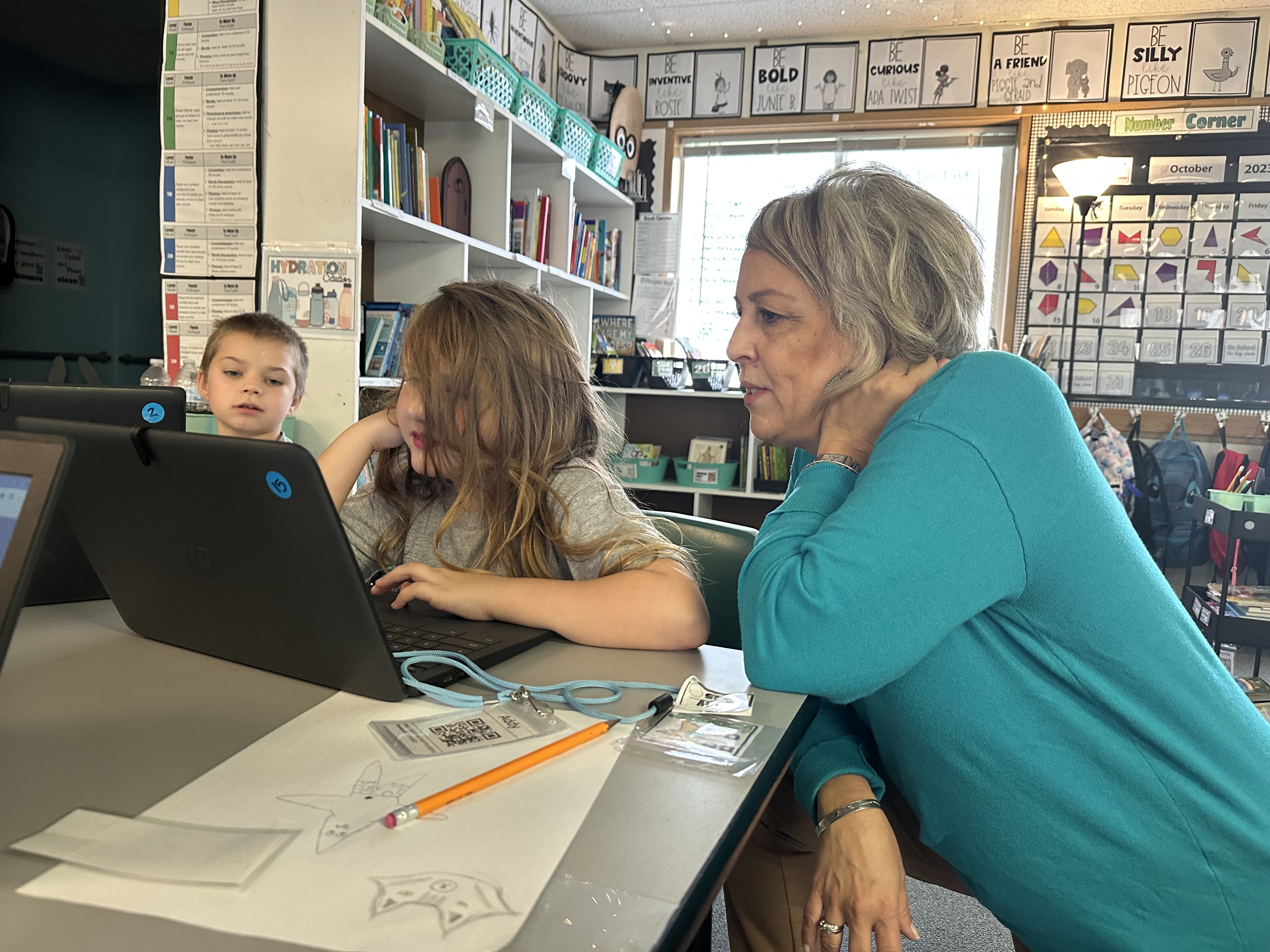 Board member visits with students