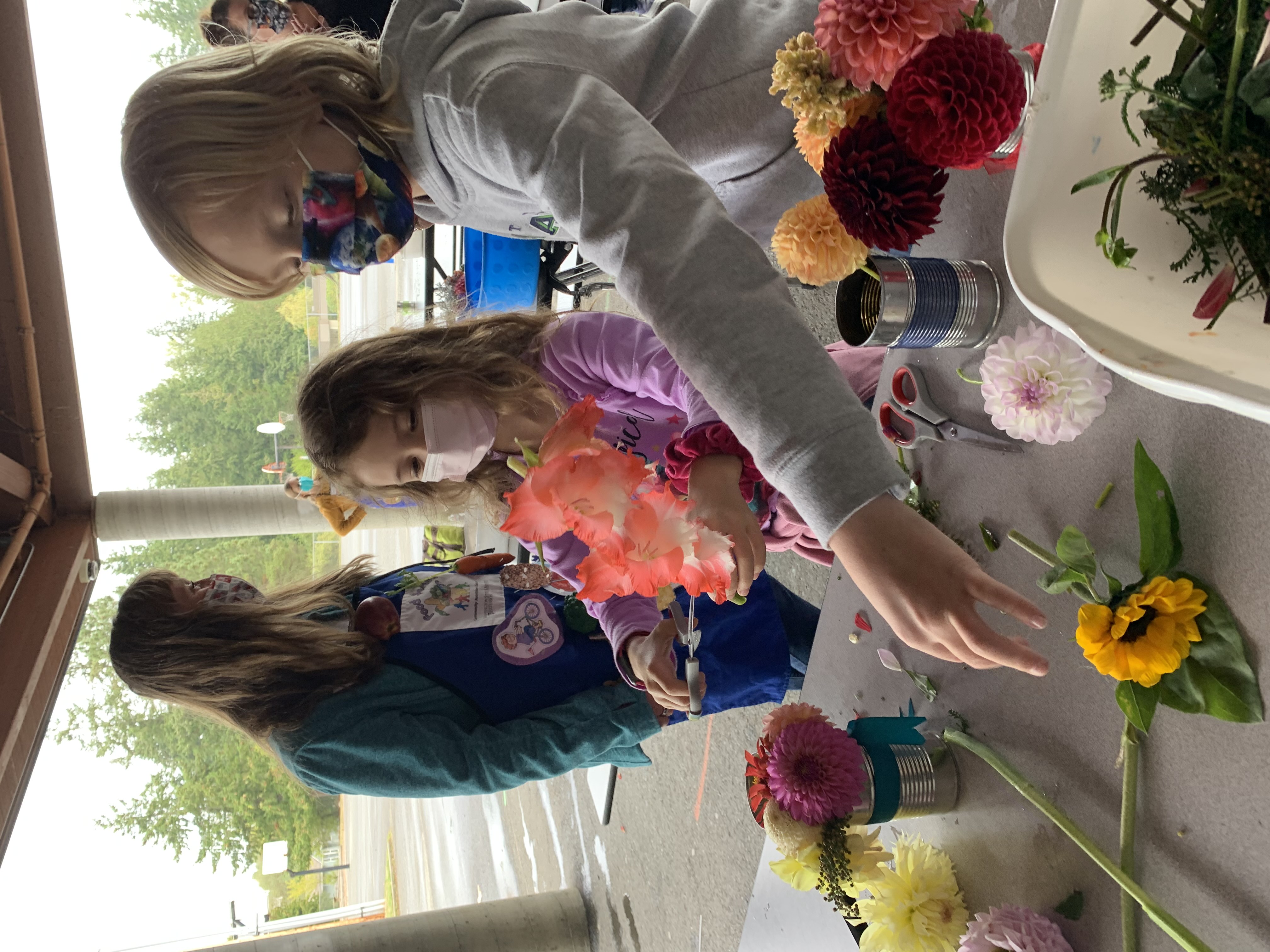 Students working on flower arrangements.