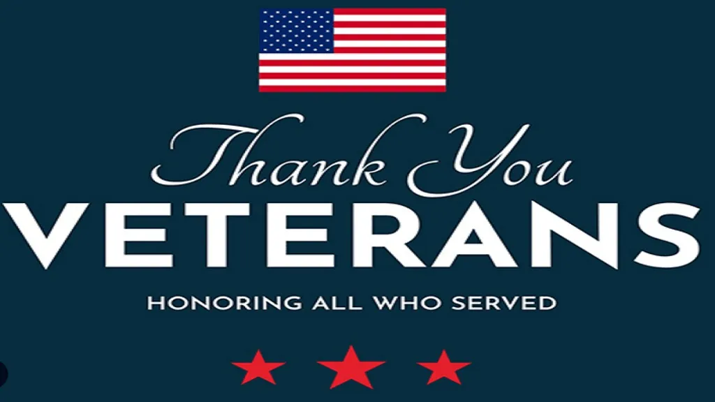 Sign saying "Thank you Veterans - Honoring All Who Served".